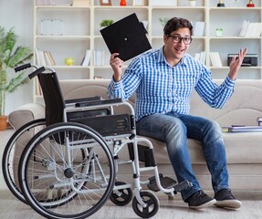 Young student on wheelchair in disability concept