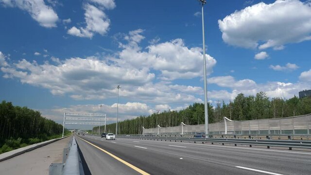 Asphalt ringroad ZSD. Speedway with cars around Saint-Petersburg in Russia