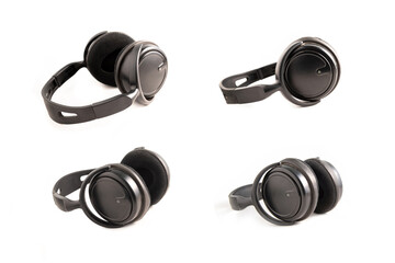 Black wireless headphones on white background.