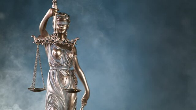 The Statue of Justice - lady justice or Iustitia / Justitia the Roman  goddess of Justice on a dark fire background Stock Photo | Adobe Stock