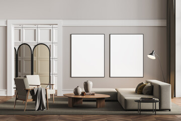 Two framed mockup posters in villa living room design interior, beige furniture on bright wall, wood floor, folding screen. Concept of relax.