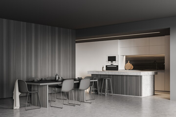 Grey and wooden kitchen corner: table, bar, cabinets