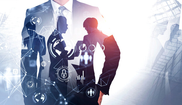 Front view of businessman in in suit with hand in pocket. Double exposure and working colleagues on background, glowing protection icons. Concept of cyber security and data storage