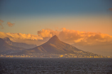 Fototapeta na wymiar Lion's head, Table mountain and signal hill at sunset in cape town