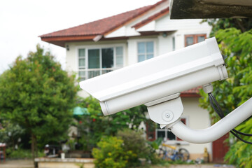 Professional technician installing CCTV cameras or surveillance systems in buildings, offices,...