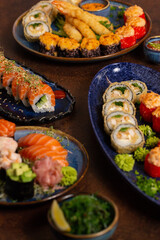 Big Sushi, Sashimi, Rolls Set on Table. Asian Cuisine. Healthy Food.