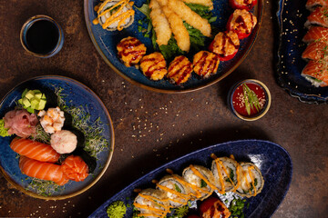 Big Sushi, Sashimi, Rolls Set on Table. Asian Cuisine. Healthy Food.