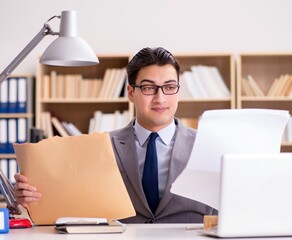 Businessman receiving letter in the office