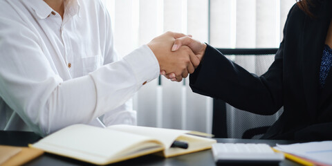 Business partnership meeting concept. Image businessmans handshake. Successful businessmen handshaking after good deal. Group support concept
