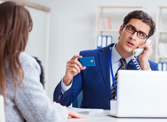 Woman makes payment with credit card