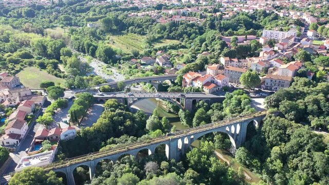 Flight over the city Ceret on summer day. France