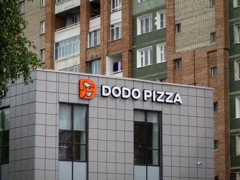 Kazakhstan, Ust-Kamenogorsk, may 22, 2021: Dodo Pizza is a modern delivery-oriented pizza brand. Restaurant of fast food in the outskirts of Ust-Kamenogorsk. Worldwide network of fast food restaurants