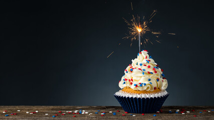 Birthday Cupcake American style. Sparkler light burning in a cake. 4th of July, Independence,...