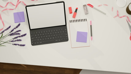 Top view of digital tablet with mock-up screen and keyboard on feminine workspace, 3D rendering