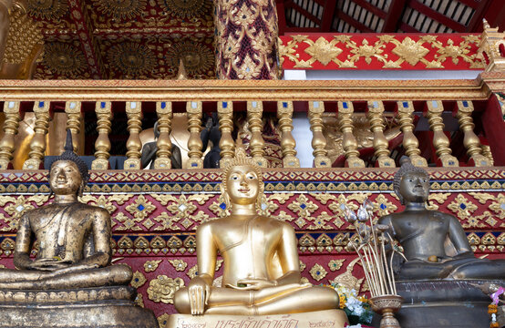 A replicate of Phra Chao Kao Tue, a bronze Buddha image in the temple at Wat Suan Dok, Chiang mai, Thailand.
