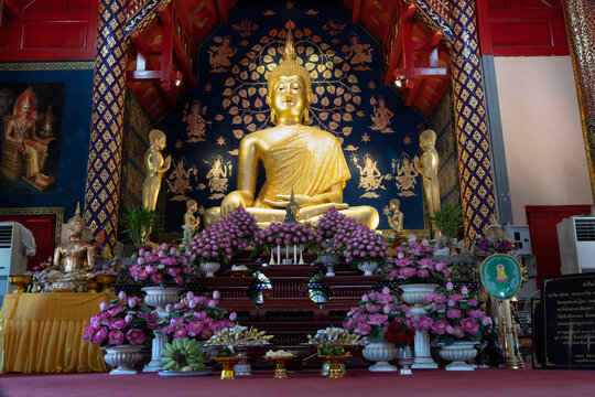Phra Chao Kao Tue, a bronze Buddha image in the temple at Wat Suan Dok, Chiang mai, Thailand.