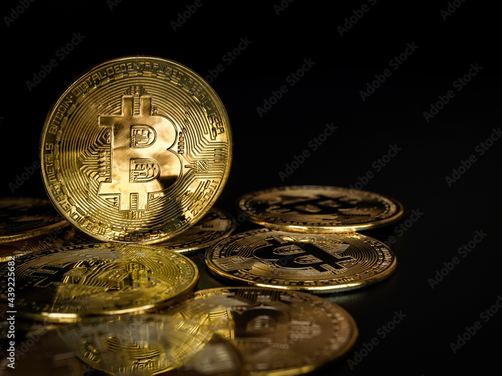 Poster bitcoin technology background. bright and shiny golden bitcoin on dark background with copy space. c