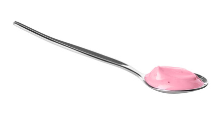 Spoon with tasty yogurt on white background