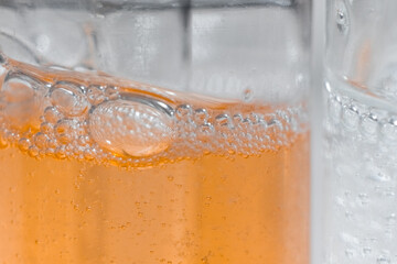 Eco Mineral oil in glass bottles with pipette dropper. Transparent hyaluronic serum gel and skin care concept. Top horizontal view.