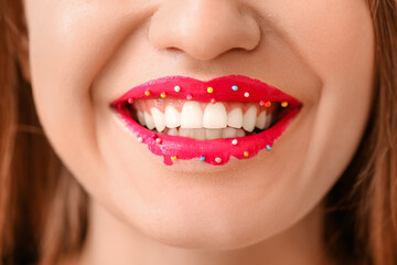 Beautiful young woman with creative makeup, closeup
