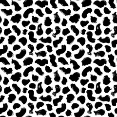 Hand drawn polka dot texture. Seamless black dots pattern with different grunge rounded spots. Vector modern messy ink dry brush strokes on white background. Wallpaper, paper, fabric, textile design.