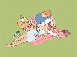 A couple is having a romantic time on a mat in the park. hand drawn style vector design illustrations. 