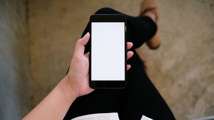 Close up of women's hands holding cell telephone blank copy space screen. smart phone with technology concept