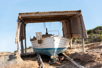 Fototapeta na wymiar Fisherman's boat on the beach of Illetes in Formentera, Spain.