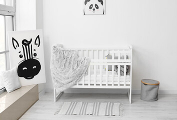 Interior of stylish children's room with comfortable bed