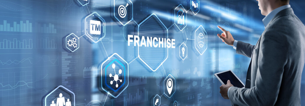 Businessman Hand Touching Inscription Franchise Marketing System