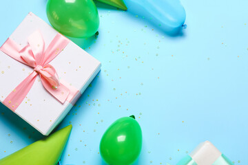 Festive composition with air balloons on color background