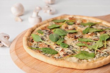 Delicious vegetarian pizza on wooden background