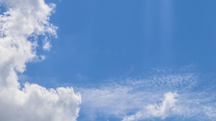 Fototapeta na wymiar Background of blue sky with white clouds. High quality photo