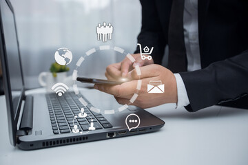 Businessman counting on calculator and reviewing budget business with icons business