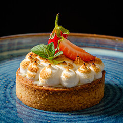 tart with fresh strawberries and vanilla cream