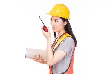 Female foreman with a safety helmet and smartphone. Woman professional builder, repairman or technician in yellow hardhat and workwear isolated on white background.