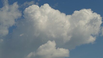 Naklejka na ściany i meble white beautiful clouds in the blue sky
