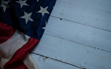 The  Flag of  United States of America  on natural wood table image for American freedom and Independence or Background with copy space concept.
