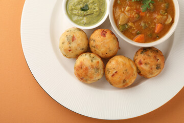  Paniyaram served with coconut chutney and sambar- South Indian breakfast
