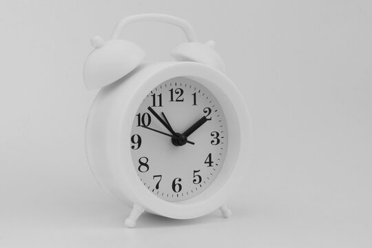 Black and white image of alarm clock with copy space
