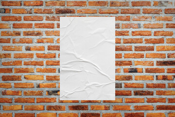 Blank white wheatpaste glued paper poster mockup on brick wall background - obrazy, fototapety, plakaty