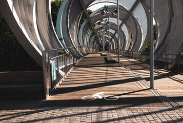 Bicycle lane on the bridge with shadow, Madrid, Spain 