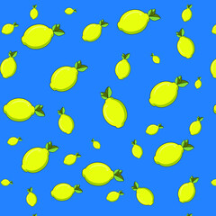 Fruit pattern from fresh yellow lemons on a blue background. creative summer concept.