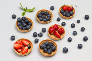 Blueberry and strawberry tartlets.