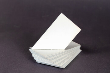 Abstract geometric composition of white quadrangles on a gray background. Various geometric shapes with only right and acute angles.