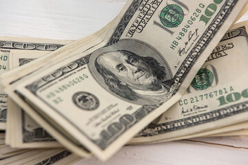 business concept pile of 100 dollar bills saving