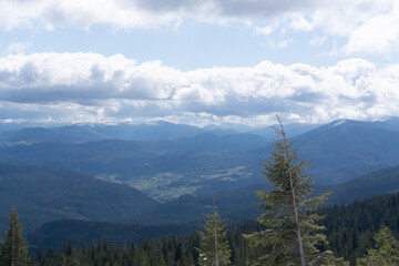 Landscape of carpathian mountains. Nature scenery in spring time with clouds on the sky