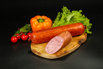 Pork ham sausage cut isolated