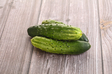 Fersh juicy green cucumbers heap