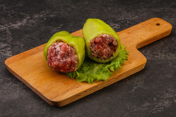 Raw stuffed bell pepper with meat